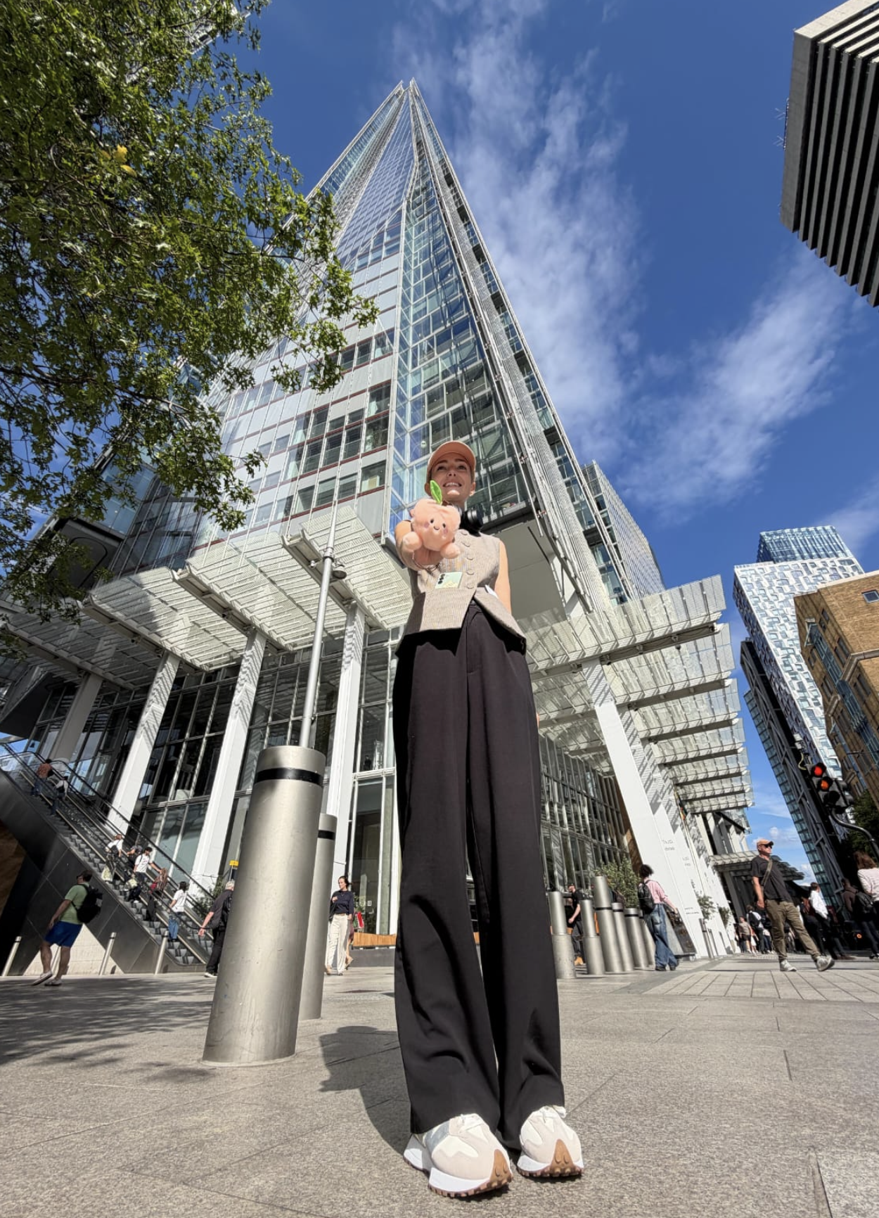 SJ holding the peach toy up at The Shard, Canary Wharf
